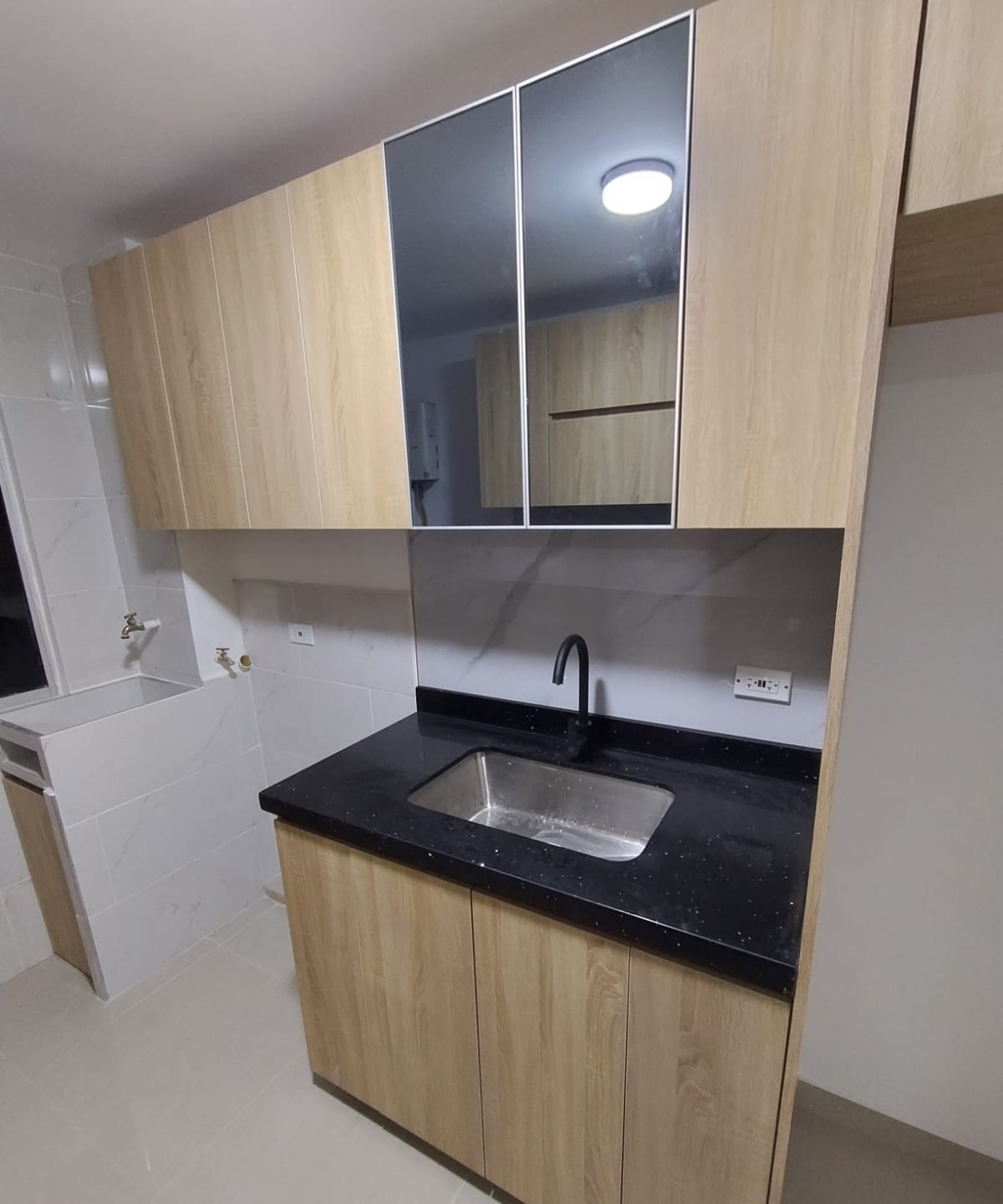 Zona de lavandería y cocina auxiliar